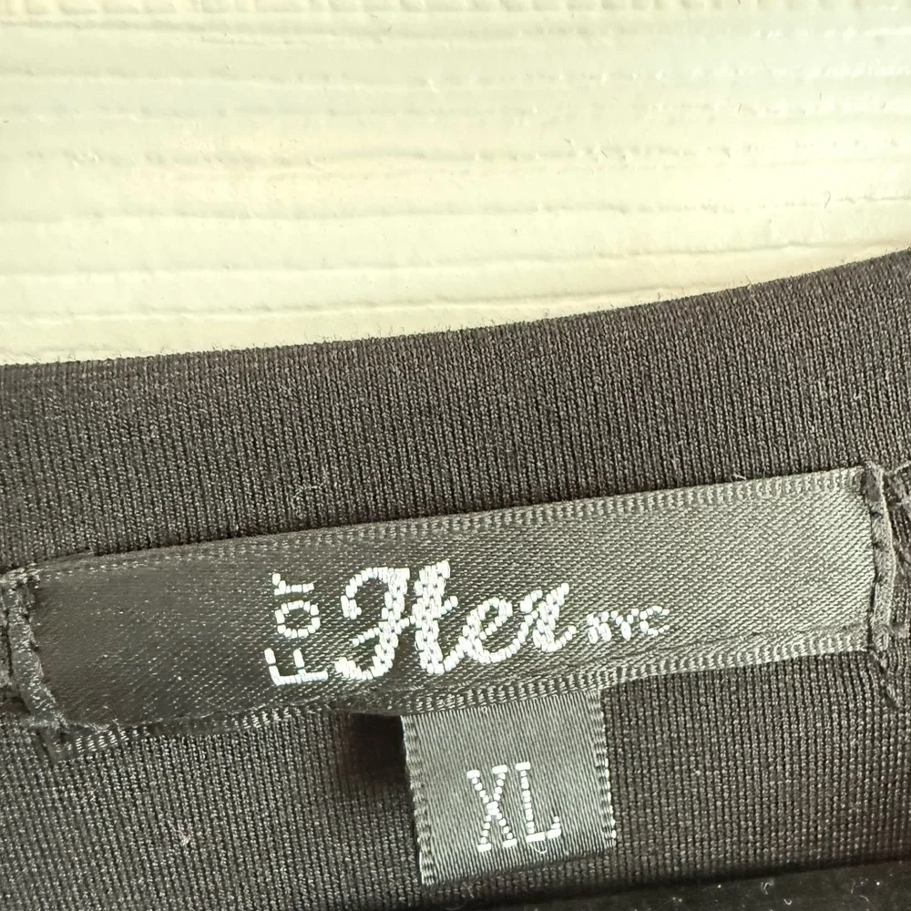 Elegant Black Top with Graphic and Sheer Sleeves - Picture 3 of 3